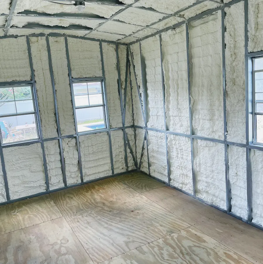 Closed-cell spray foam insulation applied to wall cavities in a residential project in Kettering